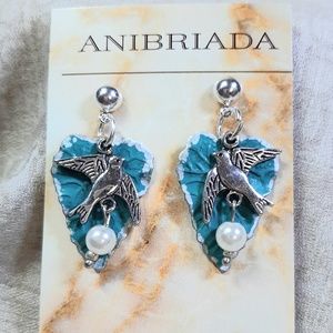 NWT FLOATING BIRD WITH EGG OVER TEAL LEAF EARRINGS